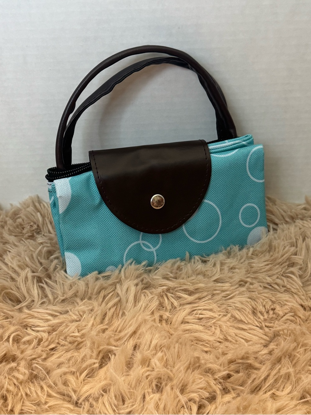 Turquoise Circle Print Wristlet Clutch with Dark Brown Trim